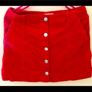 Bright red mini skirt
